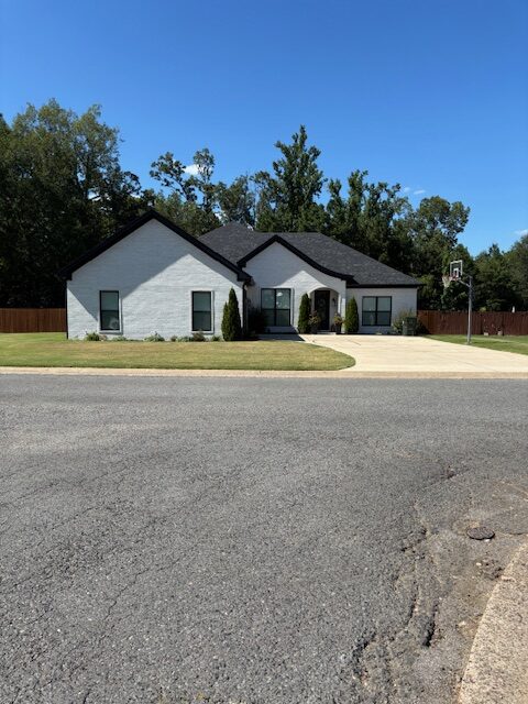white brick new construction home