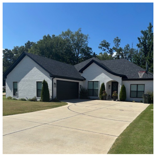 white brick home